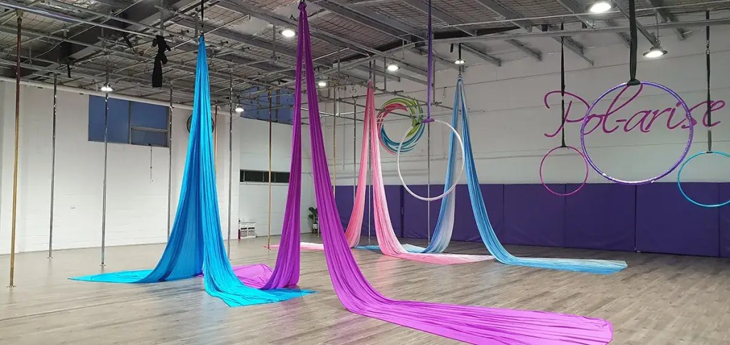 Contact Pol-arise Newcastle – spacious studio with poles, aerial hoops and silks