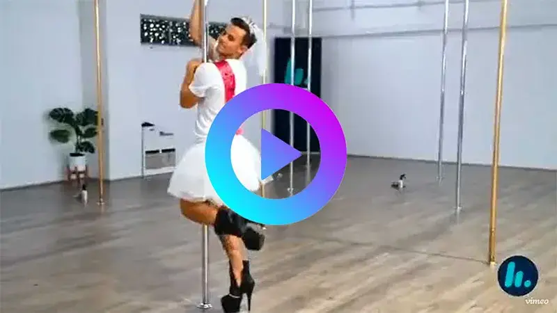 Male pole dancer spinning on a pole during hens party at Pol-arise Newcastle studio